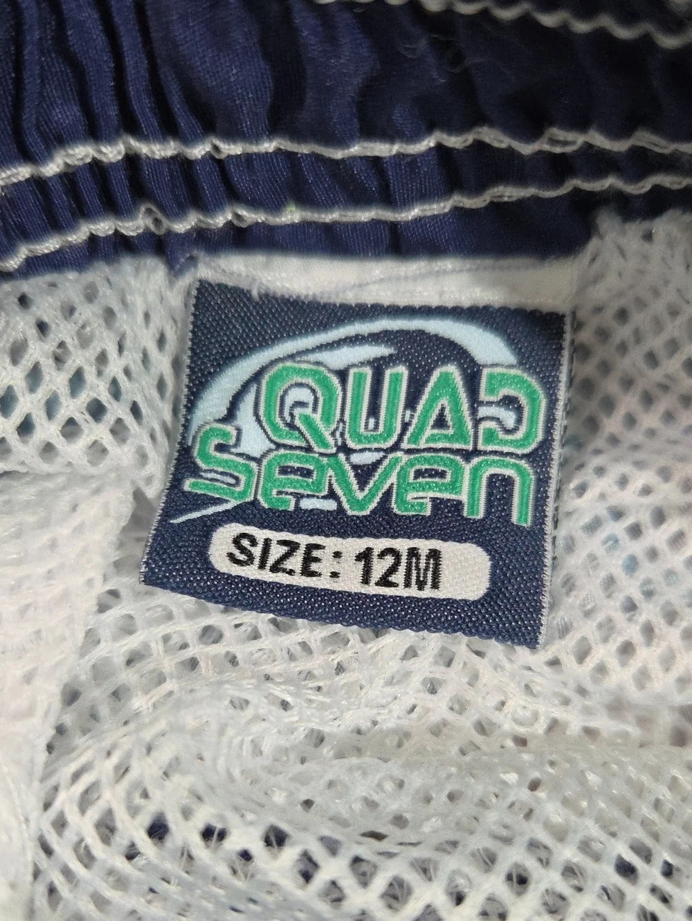 Quad Seven size 12m